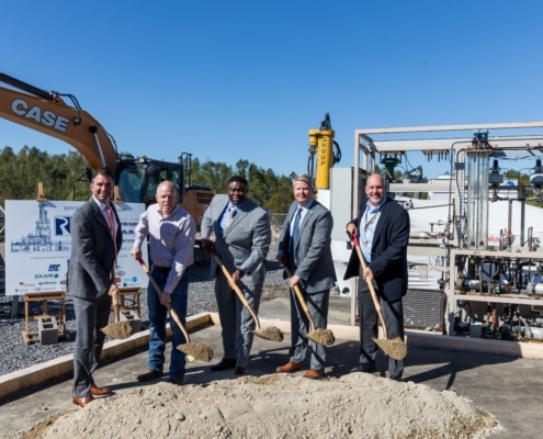 Company leadership breaking ground on plant